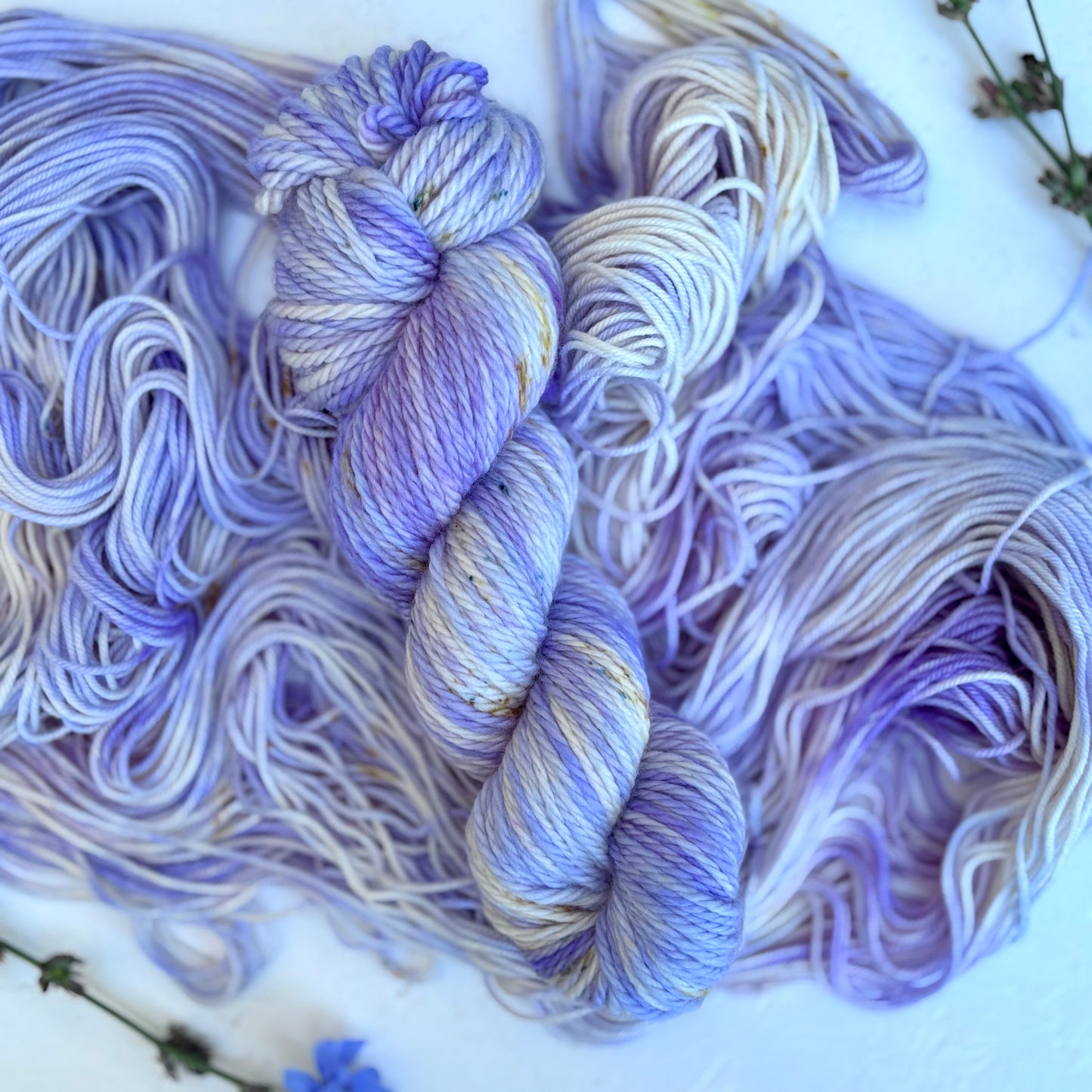 Multicolored yarn skeins on a white background